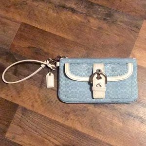 Baby blue wristlet with white leather detailing